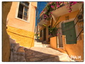 Golden house walls of Yialos